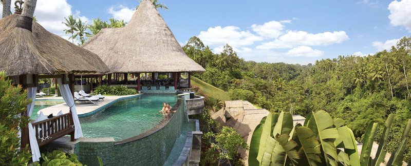 Pool overlooking rich tropical landscape