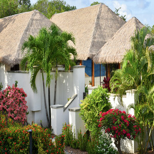 One of the 4-bed villas amongst the lush gardens